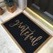 Gracie Oaks Twerton Personalized Non-Slip Outdoor Door Mat Synthetics in White/Black/Brown | 60" x 36" | Wayfair 55B174D826BF49BFA9D2C948440CB89E