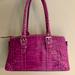 Dooney & Bourke Bags | Beautiful Fushia Dooney & Bourke Bag. | Color: Purple | Size: 13x5x7 1/2. Handles 8” From Top