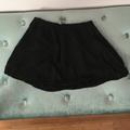 Brandy Melville Skirts | Black Stretch Skater Skirt | Color: Black | Size: One Size Fits All