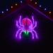 The Holiday Aisle® Halloween Giant Outdoor LED Creepy Crawling Spider 288 Light Lighted Window Decor in Green/Indigo/Red | Wayfair