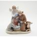 The Holiday Aisle® Mini Angel w/ Holy Family Figurine Porcelain in Blue/Brown/Pink | 3.75 H x 3.5 W x 3.38 D in | Wayfair 10520