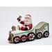 The Holiday Aisle® The Holiday Aisle Samoset Driving on The Train Salt & Pepper Set w/ Sugar Pack Holder in Red/White | Wayfair 10664