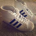 Adidas Shoes | Adidas Hi Tops White With Black Stripes Shoes | Color: Black/White | Size: 4.5bb