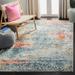 Blue/White 63 x 0.28 in Indoor Area Rug - Bungalow Rose Marques Oriental Ivory/Blue Area Rug Polypropylene | 63 W x 0.28 D in | Wayfair