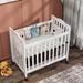 Harriet Bee Hinojosa Mini Crib w/ 3 Position Adjustable Mattress Board Wood in White | 40 H x 28 W in | Wayfair 9BCCB35270E6471BB0B7971191A8A07F