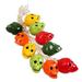 The Holiday Aisle® Bunch of Festive Skulls Finial Ornament Ceramic/Porcelain in Green/Red/Yellow | 23.5 H x 7.5 W x 0.2 D in | Wayfair