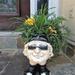 HomeStyles Muggly's Biker "Babe" in Motorcycle Attire Statue Planter Resin/Plastic | 13 H x 10 W x 9 D in | Wayfair 37474