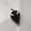Free People Jewelry | Black And Gold Arrowhead Charm | Color: Black/Gold | Size: Os