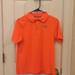 Under Armour Shirts & Tops | Boys Gently Used Under Armour Performance Polo | Color: Orange | Size: Lb