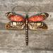 August Grove® Dragonfly Wall Décor Metal in Brown/Gray/Red | 12 H x 14 W in | Wayfair 49116A32E62D48C79F78EE548327A879