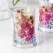 Winston Porter Dake Floral Burst Tumbler Glass in Pink | 4.5 H x 2.85 W x 3.1 D in | Wayfair BBCB10925571474DBFC1B2D96D3D7C9C