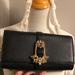 Michael Kors Bags | Authentic Michael Kors Bellamie Large Clutch | Color: Black/Gold | Size: 9.5 In W X 4.75 In H X 2 In D