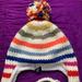 American Eagle Outfitters Accessories | Aero Knit Snow Hat Beanie Tassels Warm Multicolor | Color: Orange/Red | Size: Os