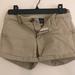 American Eagle Outfitters Shorts | Ae Midi Khaki Shorts | Color: Cream/Tan | Size: 2