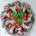 The Holiday Aisle® Christmas Wreath w/ Bright Metal Bow Burlap/Deco Mesh in Green/Red/White | 24 H x 24 W x 6 D in | Wayfair