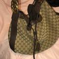 Gucci Bags | Gucci Drawstring Purse | Color: Brown/Gold | Size: Large