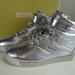 Michael Kors Shoes | Michael Kors Metallic Leather Addie High Top Shoes | Color: Silver/White | Size: Various