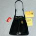 Dooney & Bourke Bags | Black Dooney & Bourke Vintage Pyramid Drawstring Bag | Color: Black | Size: 10 X 11 X 4.5 Inches