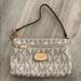 Michael Kors Bags | Michael Kors Wristlet | Color: Cream/Gold | Size: Os