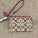 Coach Bags | Coach Corner Zip Signature Wristlet | Color: Pink/Tan | Size: Os