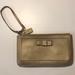 Coach Bags | Coach Large Gold Darcy Wristlet | Color: Gold | Size: Os