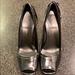 Jessica Simpson Shoes | Graphite Liquid Heels In A Silver Color | Color: Silver | Size: 7