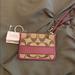 Coach Bags | Coach Slim Id Wallet Wristlet Brand New With Tags | Color: Cream/Purple | Size: Os