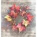 The Holiday Aisle® Maple Leaf & Coffeebean Wreath Silk/Wood/Twig in Brown/Orange/Red | 24 H x 24 W x 4 D in | Wayfair