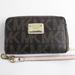 Michael Kors Bags | Michael Kors Small Ladies Wristlet | Color: Black/Brown | Size: Os