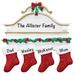 The Holiday Aisle® Stockings Family of 4 Holiday Shaped Ornament Plastic in Black/Green/Red | 4.5 H x 4.25 W x 0.5 D in | Wayfair