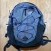 The North Face Bags | Blue And Grey North Face Backpack. | Color: Blue/Gray | Size: Os