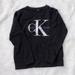 Urban Outfitters Tops | Calvin Klein Jeans Crewneck | Color: Black | Size: Xs