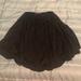 Brandy Melville Skirts | Brandy Melville Bnwot Skater Skirt In Black Osfa | Color: Black | Size: Osfa