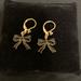 Kate Spade Jewelry | Elegant Kate Spade Golden Black Bow Earrings | Color: Black/Gold | Size: Os
