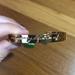 Lilly Pulitzer Jewelry | Lilly Pulitzer Gold Bracelet With Tassels | Color: Gold/Green | Size: Os