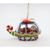 The Holiday Aisle® Snowman Flying a Helicopter Hanging Figurine Ornament Ceramic/Porcelain in Green | 3 H x 2.5 W x 5.5 D in | Wayfair