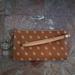 Dooney & Bourke Other | Dooney & Bourke Pebled Leather Wristlet | Color: Brown/Cream | Size: Os