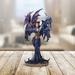 Trinx Fairy w/ Two Dragons Fantasy Decoration Resin in Blue/Indigo | 10.25 H x 6 W x 4.5 D in | Wayfair 594B24E520EB45CBBBFD44C40BC86886