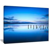 Design Art Jetty Remains Photographic Print on Wrapped Canvas in Blue Sea