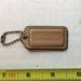 Coach Accessories | Coach Leather Replacement Hangtag Fob Light Tan | Color: Tan | Size: 1" X 2"