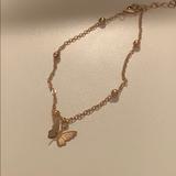 Brandy Melville Jewelry | Gold Butterfly Anklet | Color: Gold | Size: Os