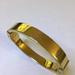 Michael Kors Jewelry | Michael Kors Gold Tone Hinged Bangle Bracelet | Color: Gold | Size: Os