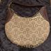 Gucci Bags | Gucci Logo Fabric Hobo With Metal Lock On Side | Color: Brown/Tan | Size: 13” X 9” X 2.5”