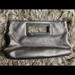 Michael Kors Bags | Michael Kors Leather Clutch- Silver | Color: Silver | Size: Os