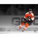 Claude Giroux Philadelphia Flyers Unsigned Orange Jersey Skating Spotlight Photograph