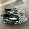 Nike Shoes | Nike Black And White Striped Knit Sneakers | Color: Black/White | Size: 7