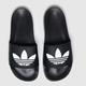 adidas adilette lite sandals in black & white