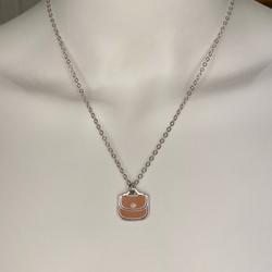Coach Jewelry | Coach Orange Purse .925 Sterling Silver Necklace | Color: Orange/Silver | Size: 18” In Length