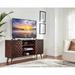 Corrigan Studio® Carlan Solid Wood TV Stand for TVs up to 75" Wood in Brown | Wayfair 4845A27D8AB446F2B19E05C9276A5D93