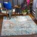 Buliok 6'7" x 9' Modern Contemporary Bohemian Abstract Cream/Light Gray/Teal/Dusty Coral/Pale Blue/Rust/Yellow/Brick Red/Rust/Orange Area Rug - Hauteloom